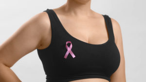 Woman pink ribbon, symbol of breast cancer